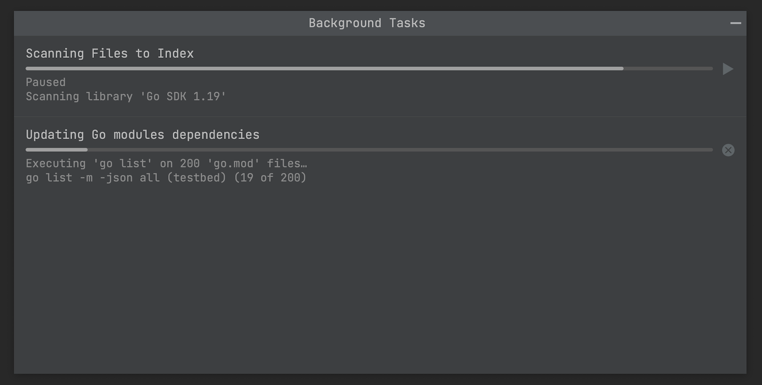 The Background Tasks window showing indexing and go list running