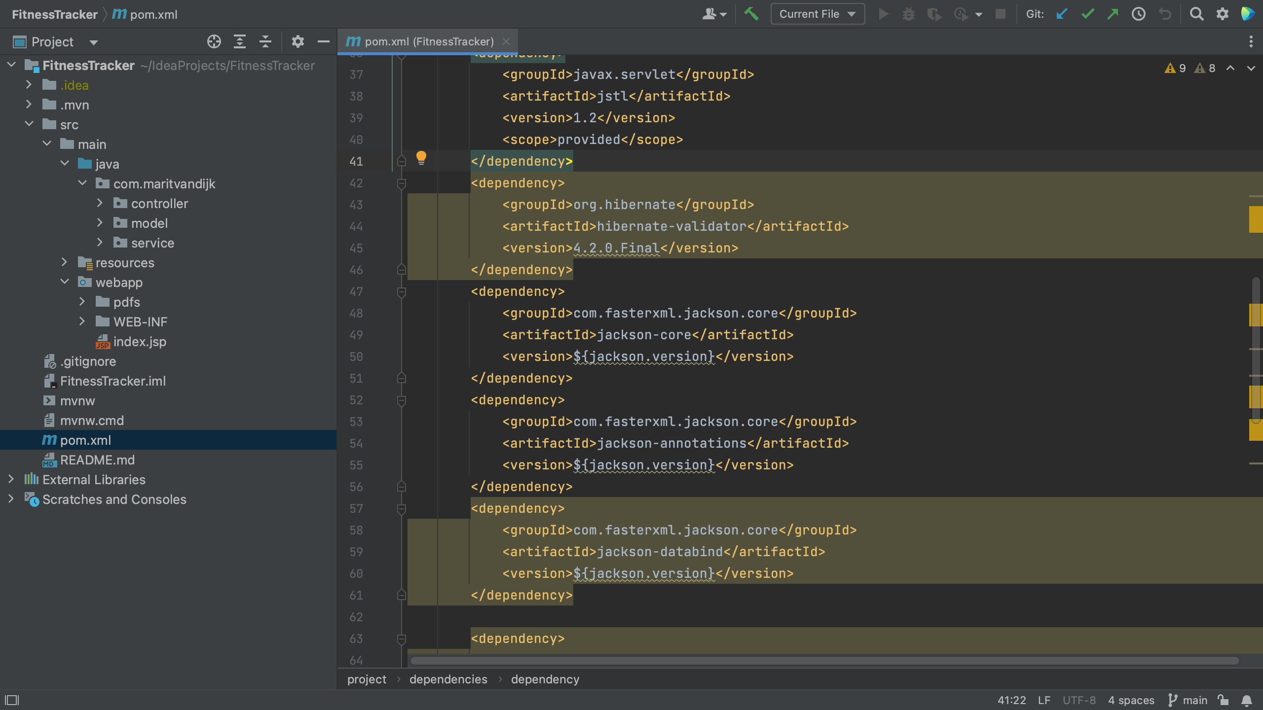 Maven pom.xml with vulnerable dependencies highlighted